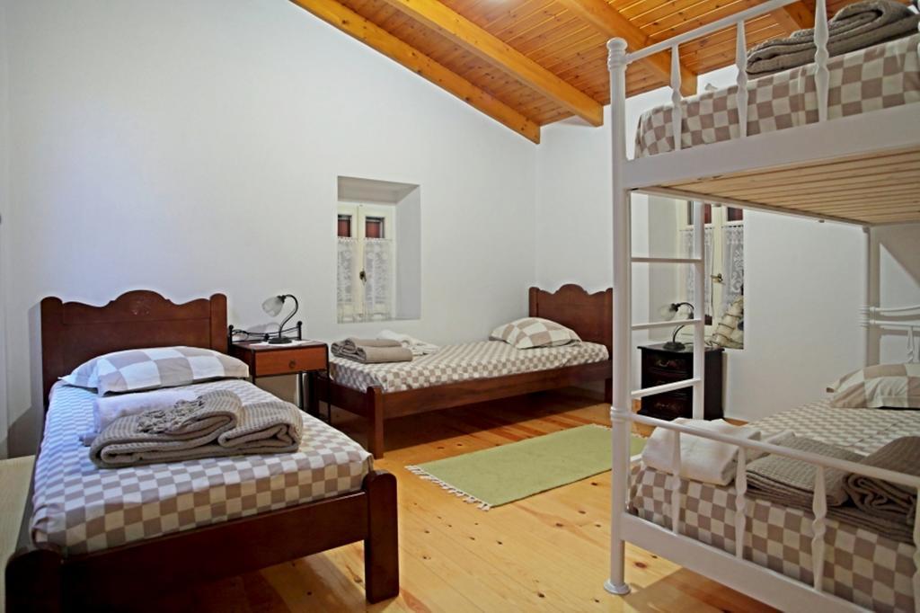 Menelia Cottage Platístoma Chambre photo